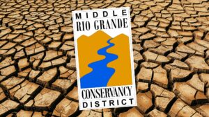 A background image of a dry cracked earth with the logo for the Middle Rio Grande Convervancy District over top.