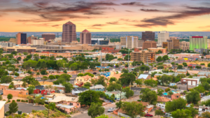 An aerial shot of the City of Albuquerque during sunset.