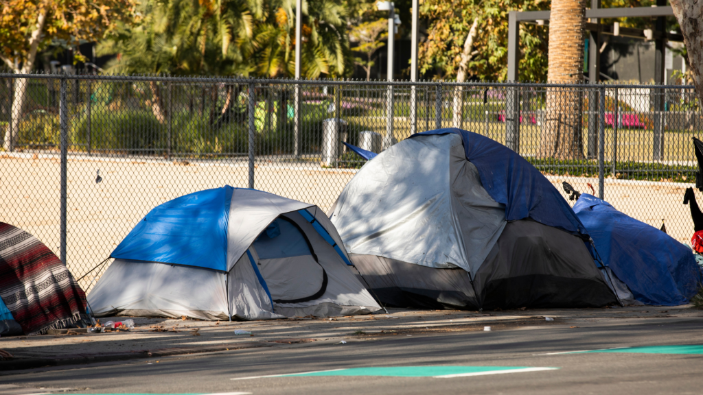 A street lined with tents.