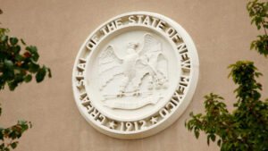 The New Mexico State Seal on the side of the Roundhouse.