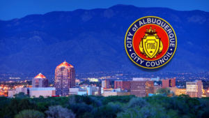 The city of albuquerque logo with mountains in the background.