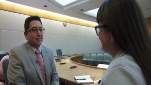 Gwyneth Doland talking to representatives at the Roundhouse.