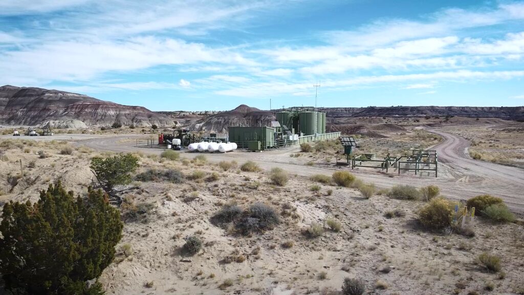 An aerial view of an oil field in the desert.