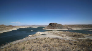 An aerial view of a lake in the desert.