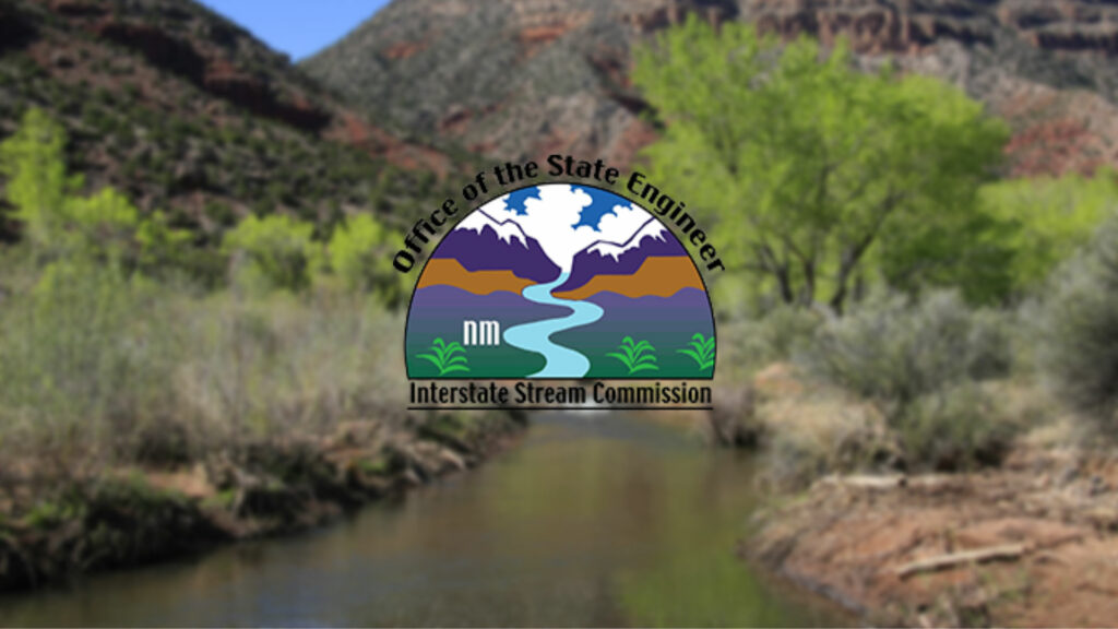 An image of a river with mountains in the background.