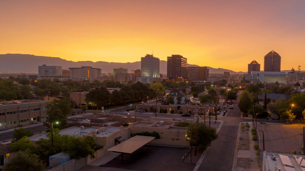 A city skyline at sunset.
