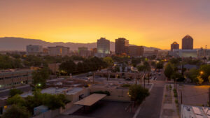 A city skyline at sunset.