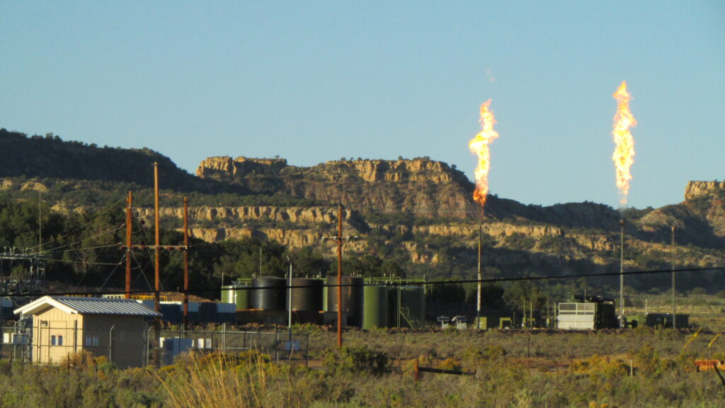 A mountain range in the background.