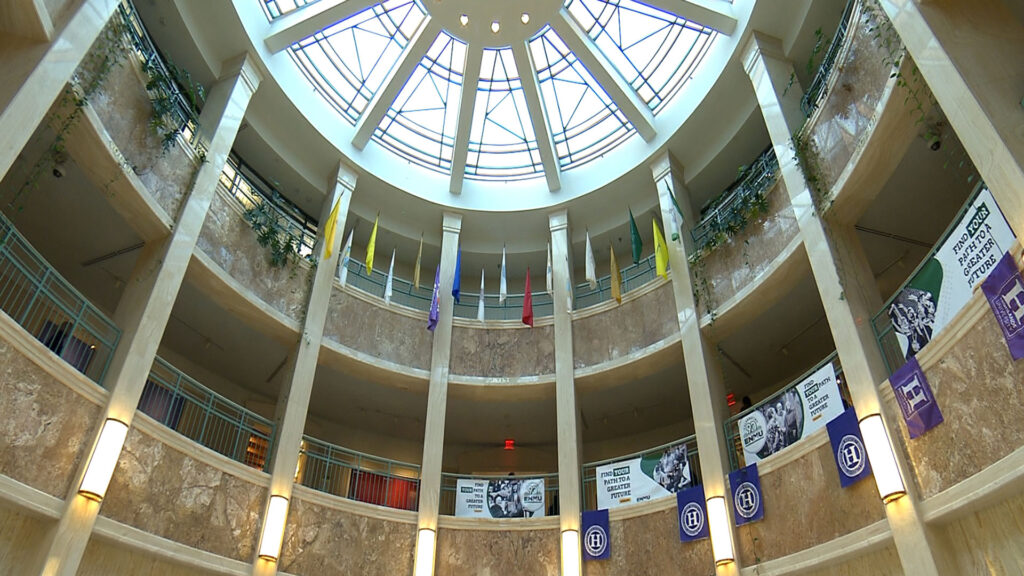 The atrium of a building with a circular ceiling.