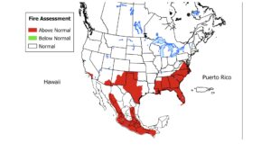 Map of North America showing fire assessments. Areas marked in red indicate above normal fire risk, primarily in the southern United States, Puerto Rico, and parts of Mexico.