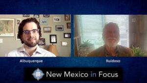 Screenshot of a virtual interview with two men labeled "Albuquerque" and "Ruidoso" on screen, titled "New Mexico in Focus.