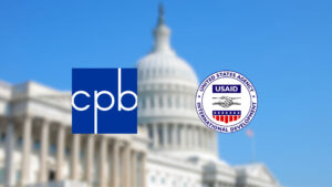 Logos of the Corporation for Public Broadcasting and USAID appear in front of a blurred image of the U.S. Capitol dome.