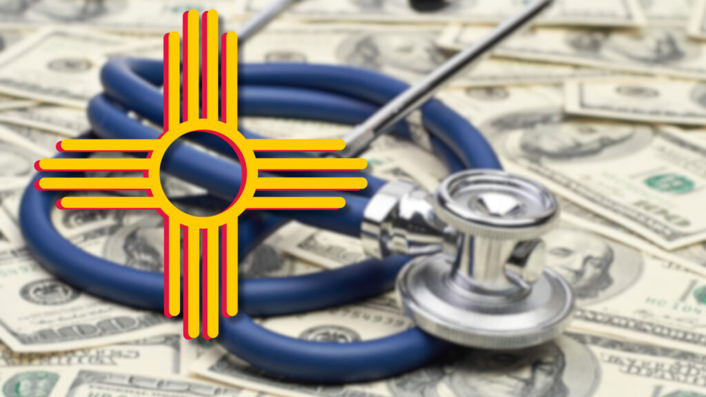 A stethoscope on a pile of US dollar bills with the New Mexico state flag symbol overlaid, representing healthcare costs in New Mexico.