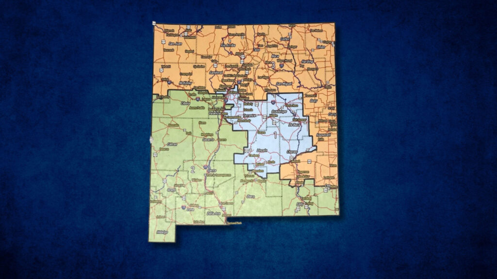 A color-coded map of New Mexico shows different regions divided by orange, green, and blue shaded areas, with cities and highways labeled.