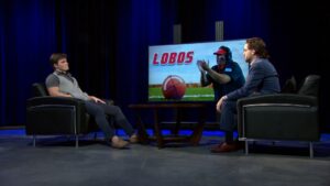 A man and woman sitting in chairs.