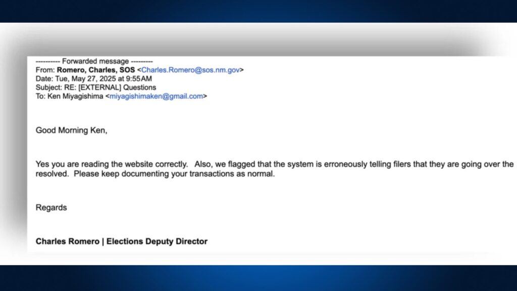 Screenshot of an email from Charles Romero confirming the website is working and noting a system error about file flags, advising to continue documenting transactions as normal.