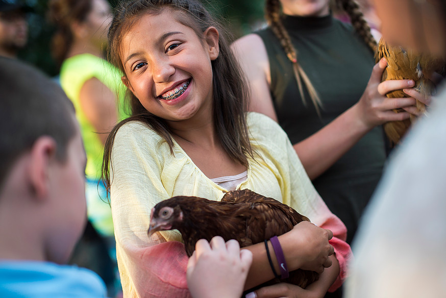 SciGirls_3 Science Girl holding Chicken