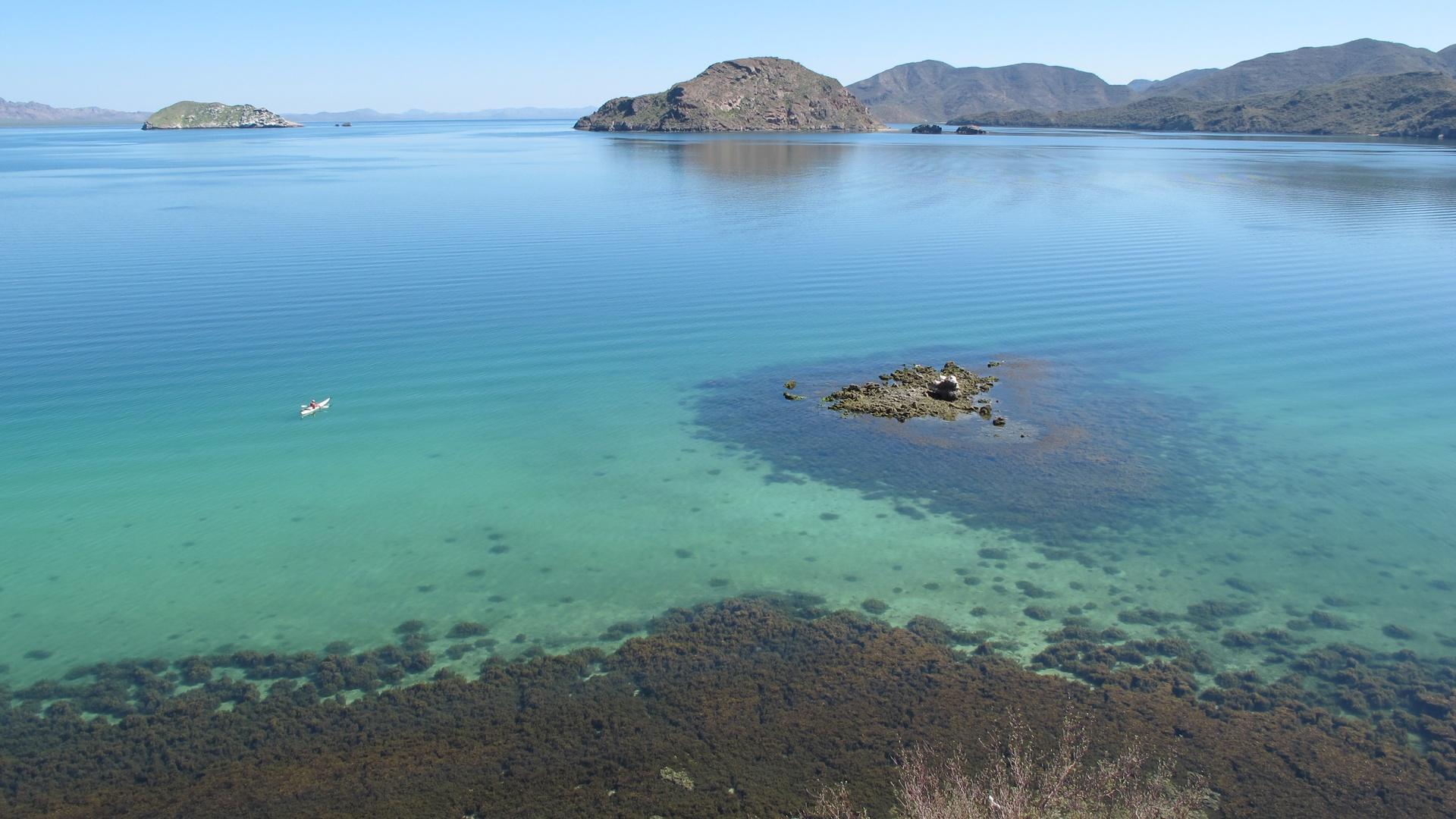 baja A large body of water with small islands within it.