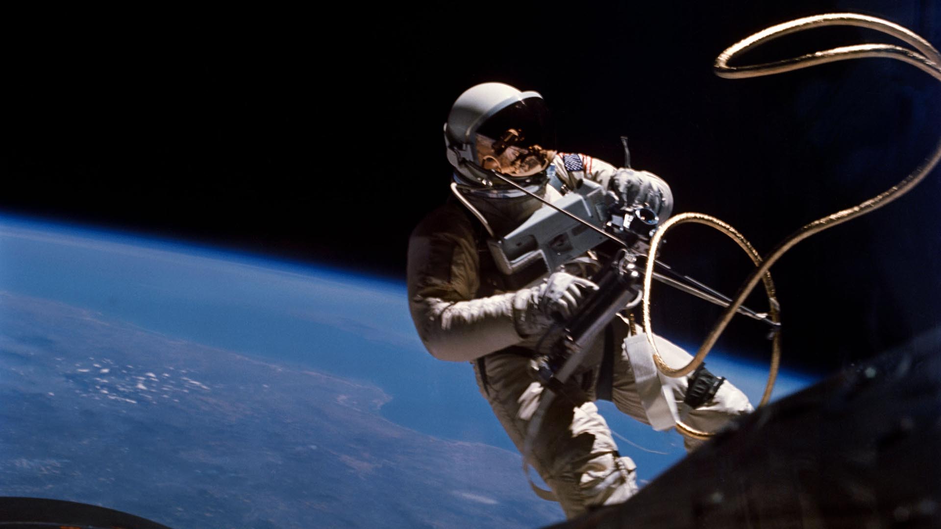 An astronaut performs a spacewalk.